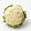 White cauliflower with green leaves White cauliflower with green leaves